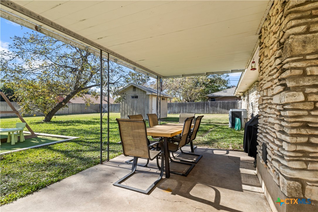 2601 Linwood Road Temple, TX 76502 - Photo 31 of 41 a view of a backyard with table and chairs
