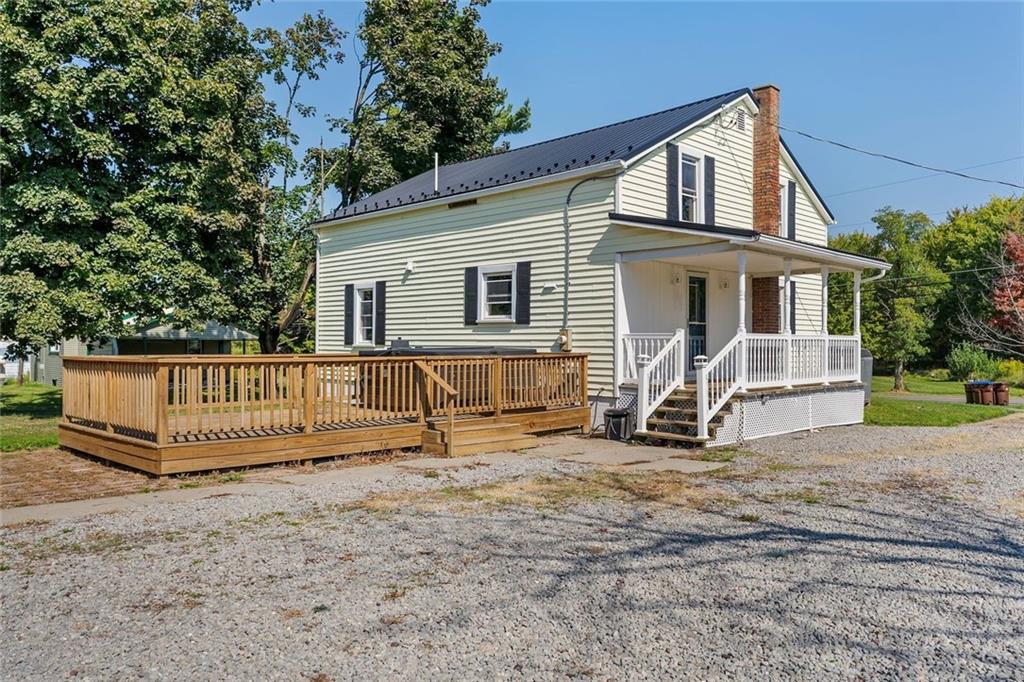 48 Kinsman Road Greenville, PA 16125 - Photo 12 of 42 a backyard of a house with table and chairs