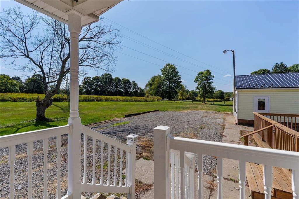 48 Kinsman Road Greenville, PA 16125 - Photo 39 of 42 a view of a porch with a yard