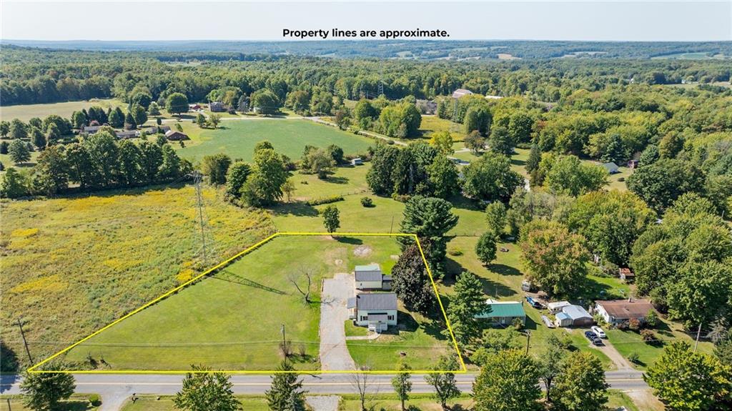 48 Kinsman Road Greenville, PA 16125 - Photo 5 of 42 an aerial view of a residential houses with outdoor space and trees all around