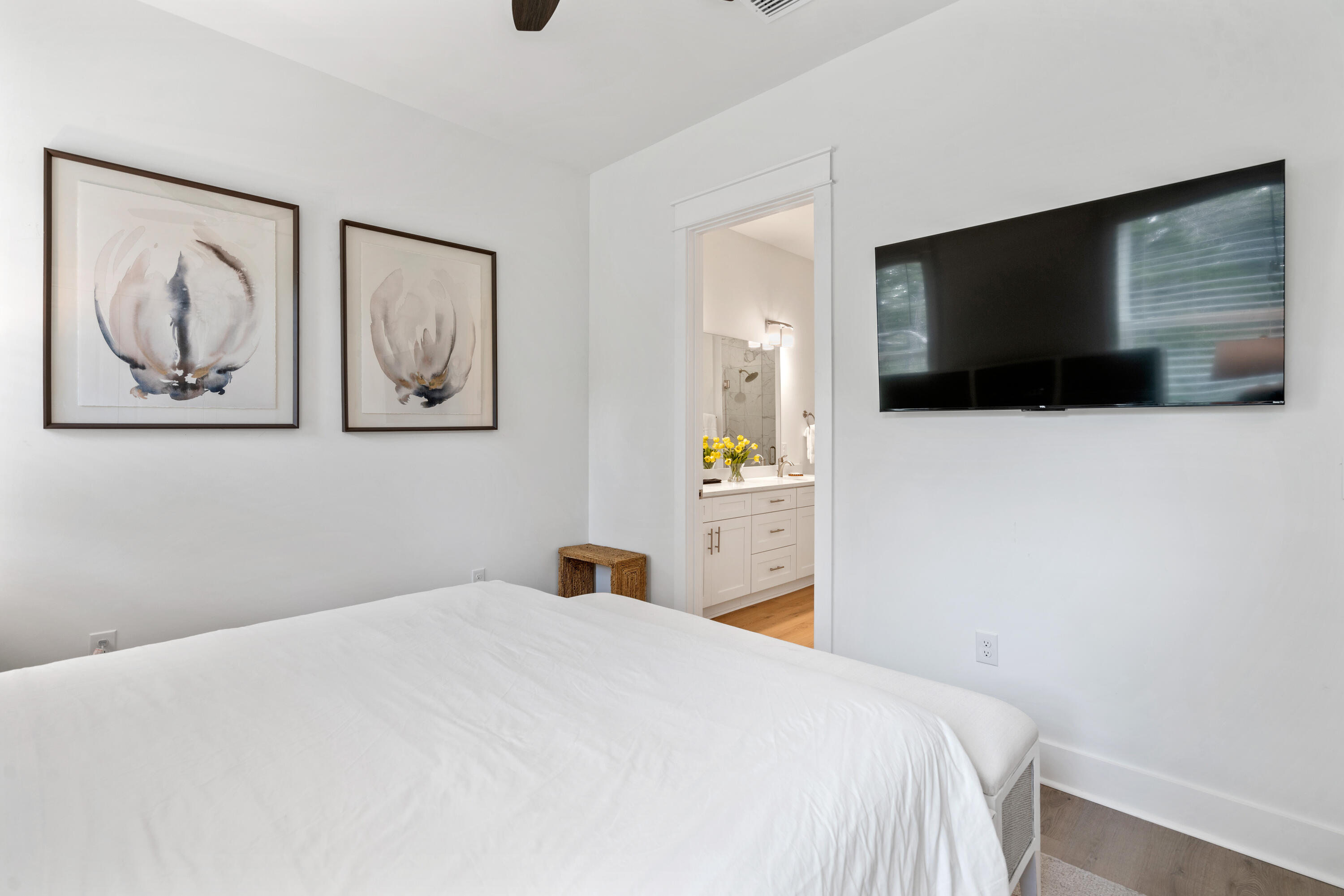 49 Conscience Way Santa Rosa Beach, FL 32459 - Photo 22 of 50 a bedroom with a bed and a flat screen tv