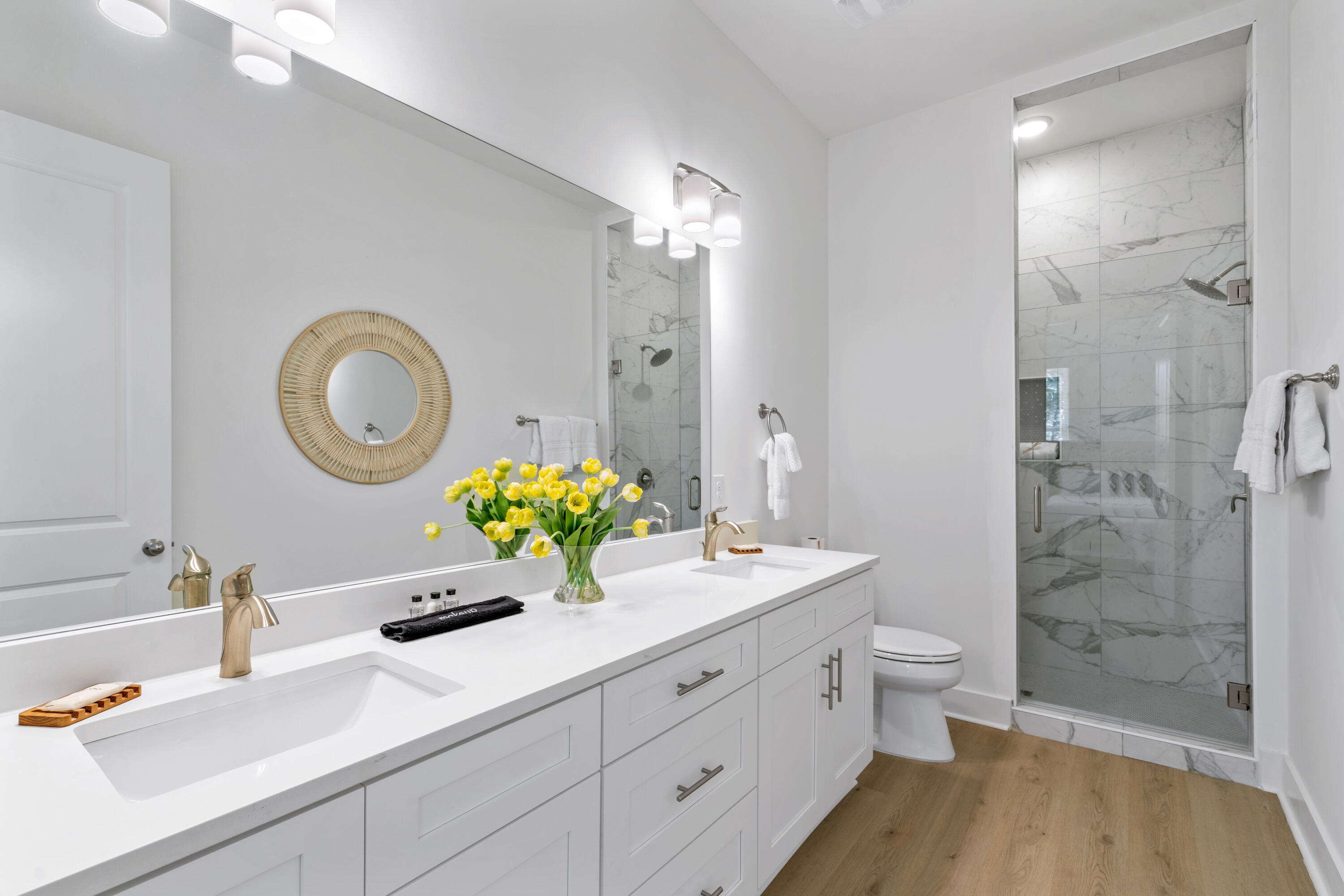 49 Conscience Way Santa Rosa Beach, FL 32459 - Photo 24 of 50 a bathroom with a granite countertop double vanity sink mirror and shower