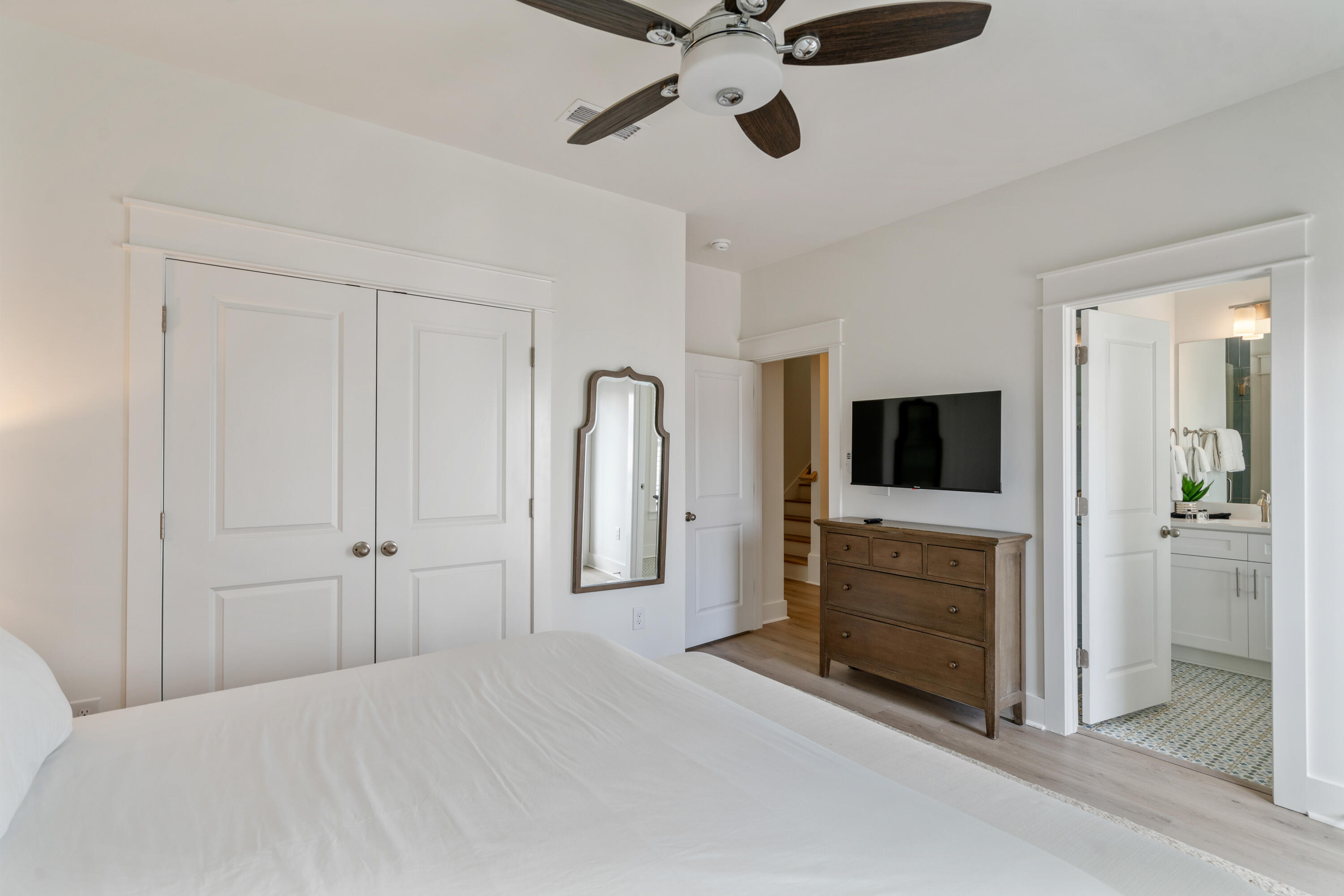 49 Conscience Way Santa Rosa Beach, FL 32459 - Photo 30 of 50 a bedroom with a bed and a flat screen tv