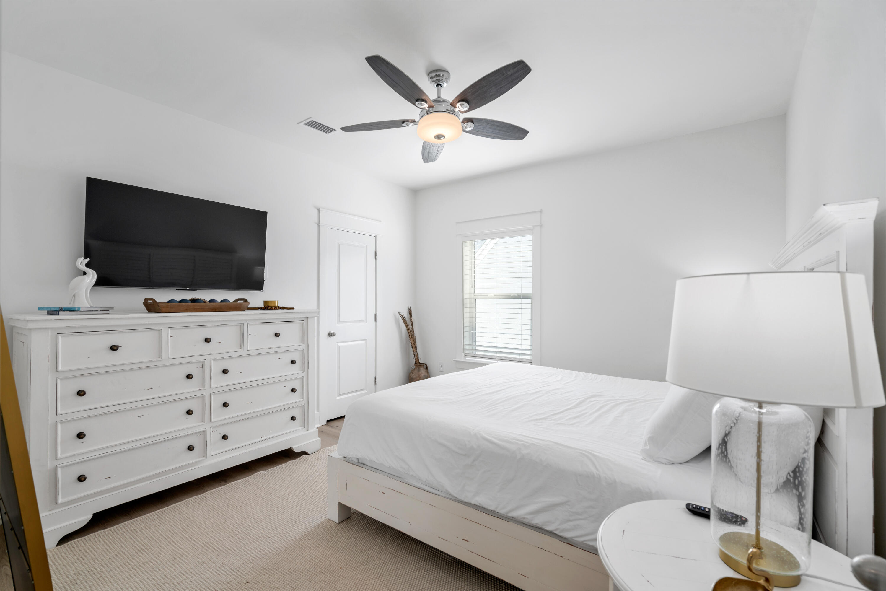 49 Conscience Way Santa Rosa Beach, FL 32459 - Photo 41 of 50 a bedroom with a bed and a flat screen tv