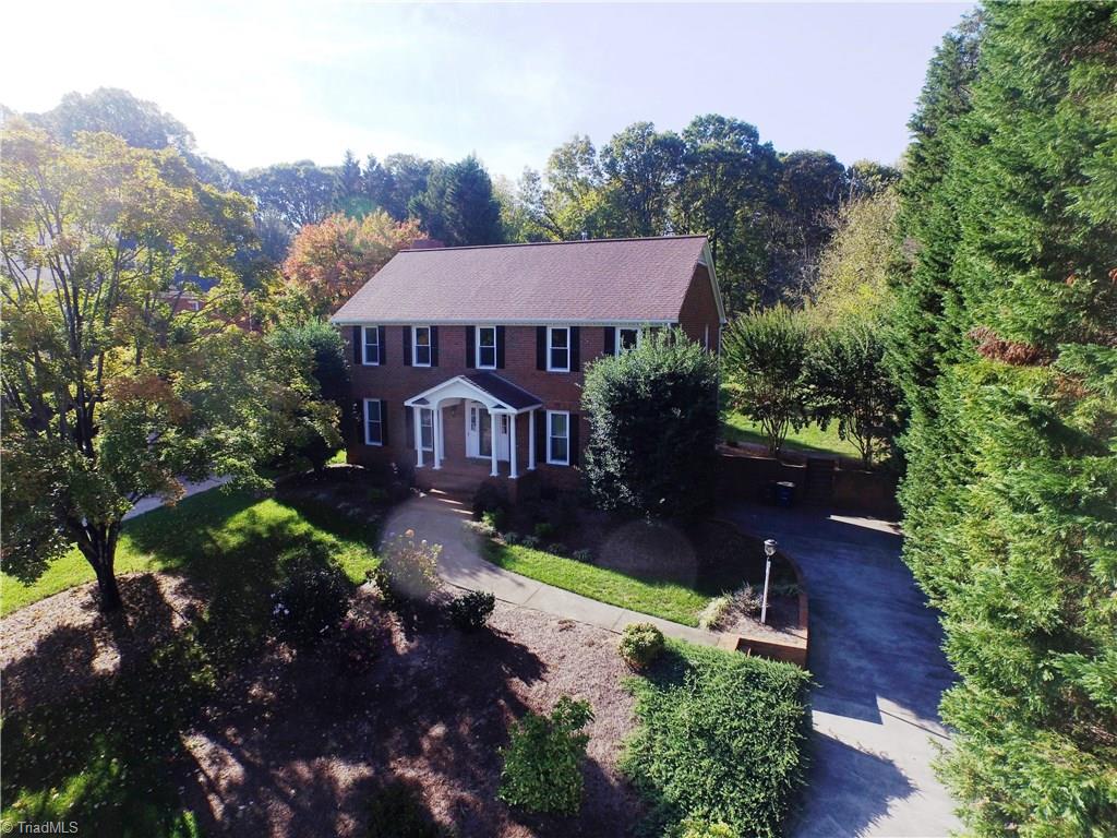 1170 Chester Road Winston-Salem, NC 27104 - Photo 1 of 30 Aerial photo of the front and View from the street. Long driveway provides ample off street parking. The trees surrounding the property provides privacy.