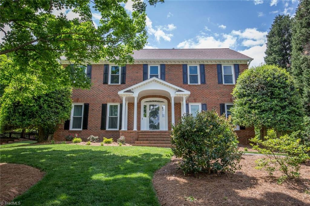1170 Chester Road Winston-Salem, NC 27104 - Photo 2 of 30 Front of Traditional home in Glenridge with meticulous and mature landscaping on .51 acres! Partially fenced patio area.