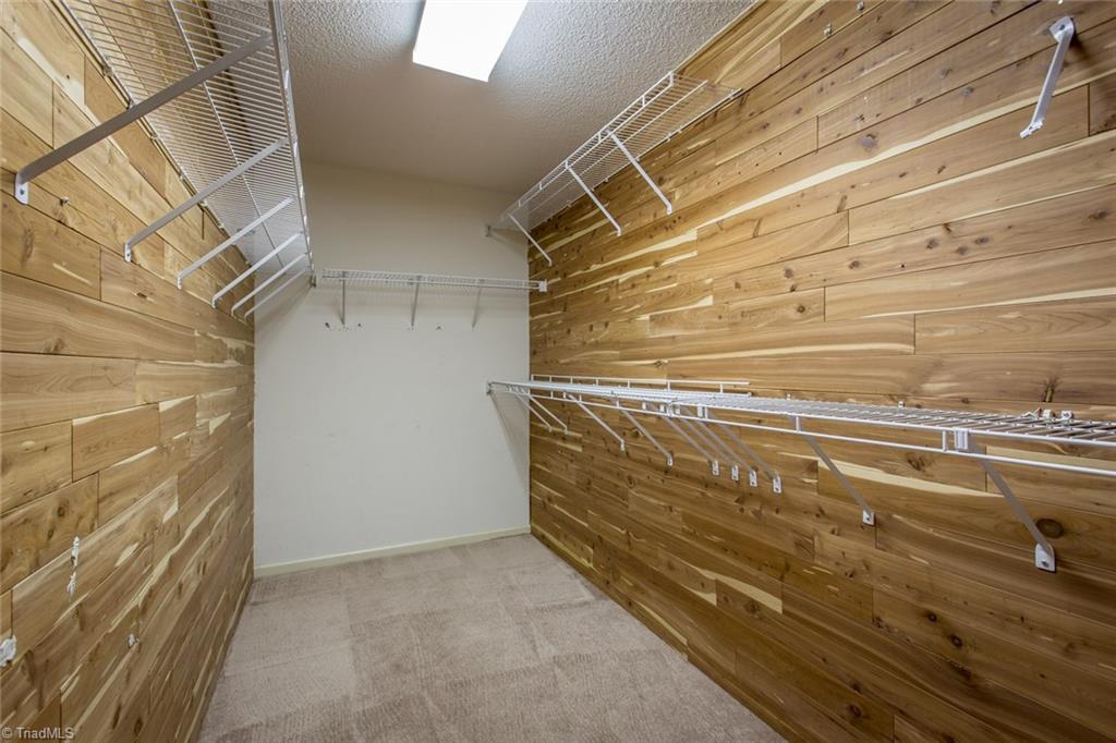 1170 Chester Road Winston-Salem, NC 27104 - Photo 27 of 30 Large walk in cedar closet off the bonus room on the lower level.