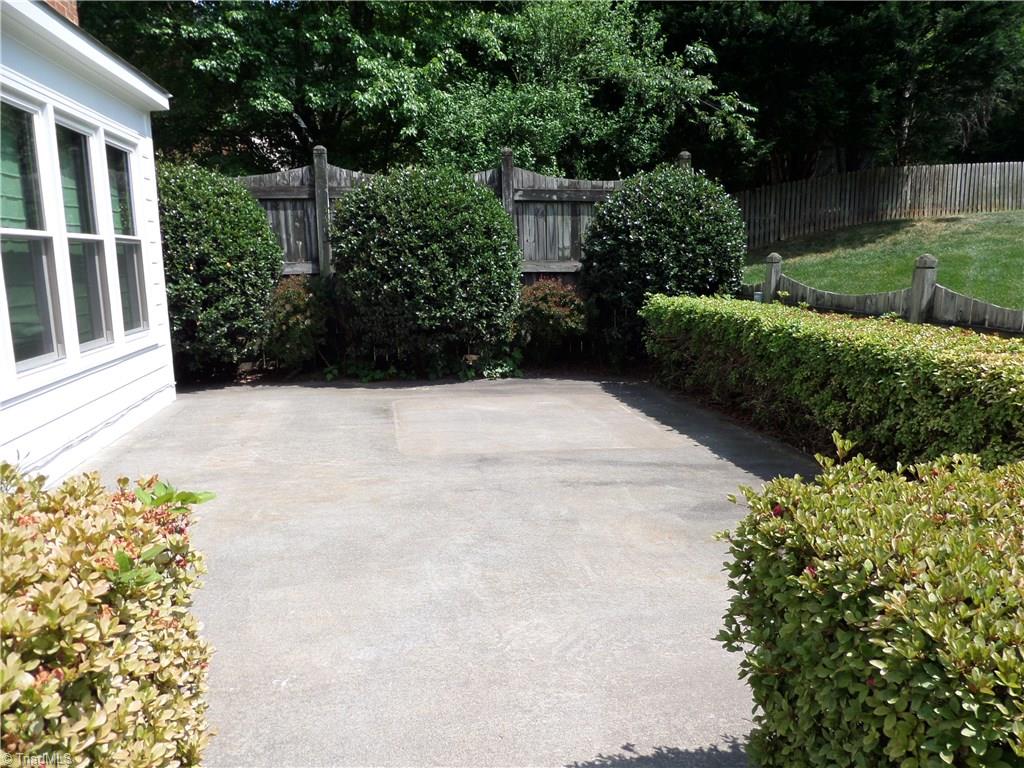 1170 Chester Road Winston-Salem, NC 27104 - Photo 28 of 30 Large patio is set off with a short hedge and privacy fence ... great area for entertaining!