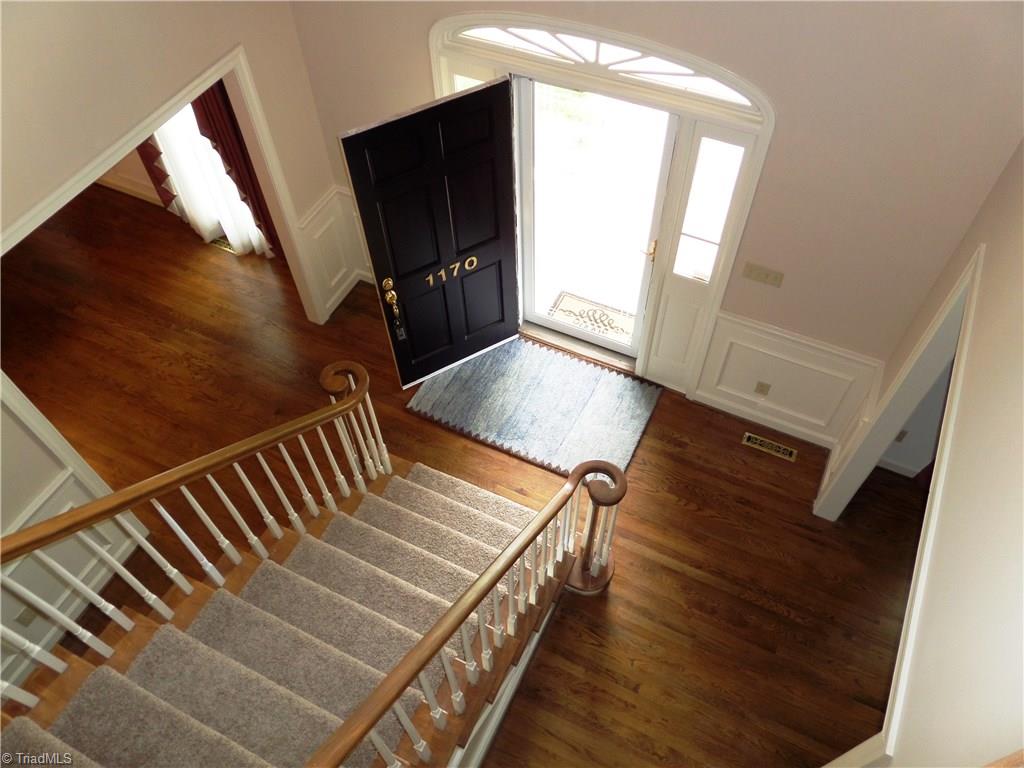 1170 Chester Road Winston-Salem, NC 27104 - Photo 6 of 30 View of the foyer from the upper level. Notice the side lights and atrium window for natural lighting.