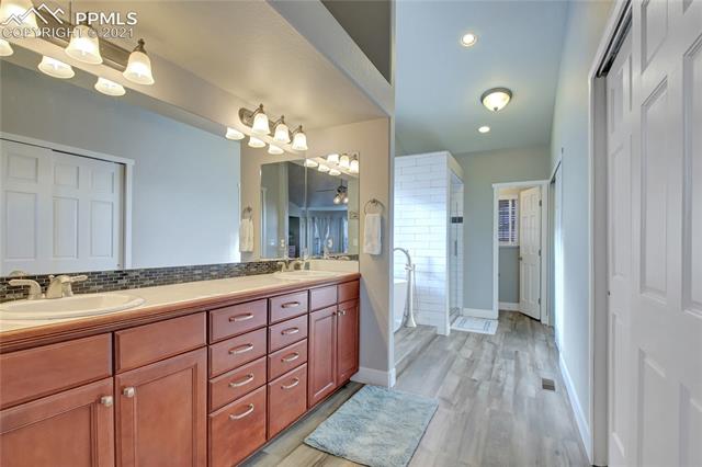9947 Rockingham Drive Peyton, CO 80831 - Photo 17 of 43 Primary bathroom on main level