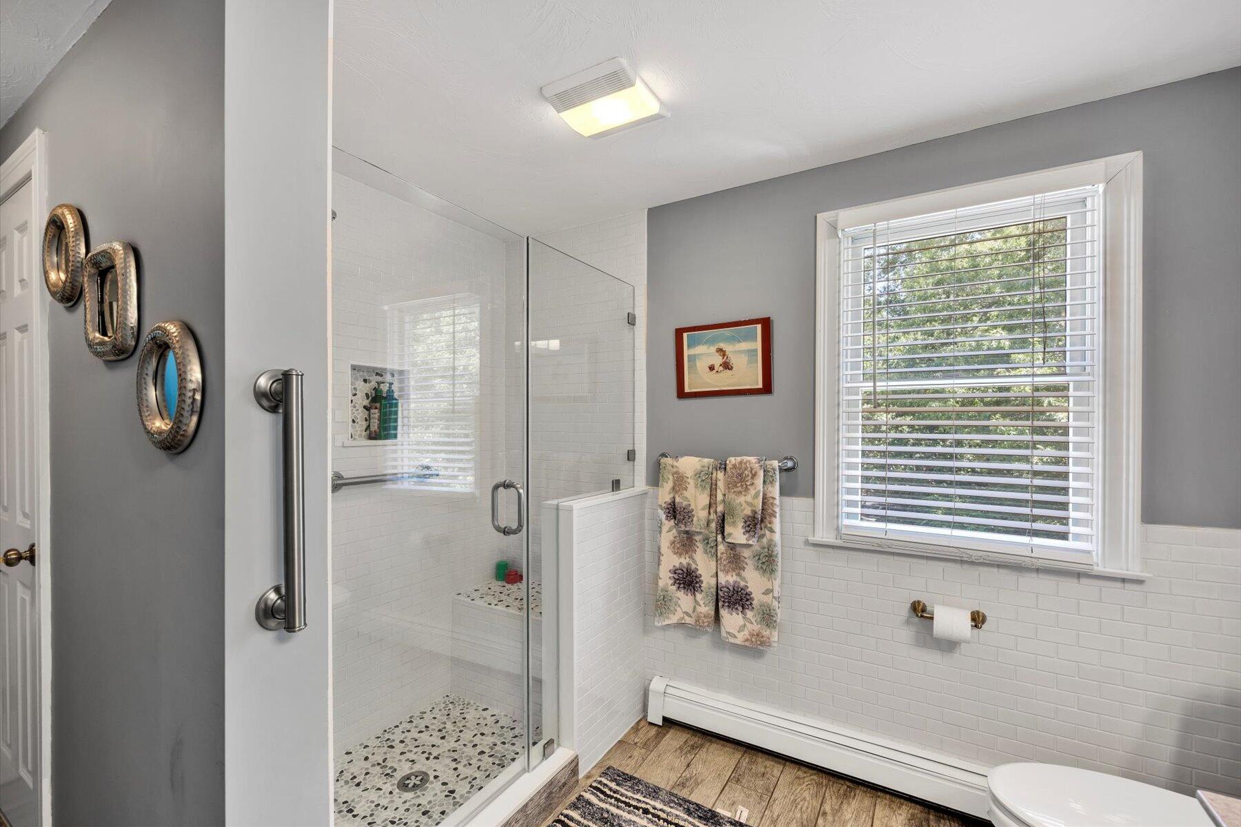 1 Ravens Nest Road Sandwich, MA 02563 - Photo 27 of 46 a bathroom with a window and shower