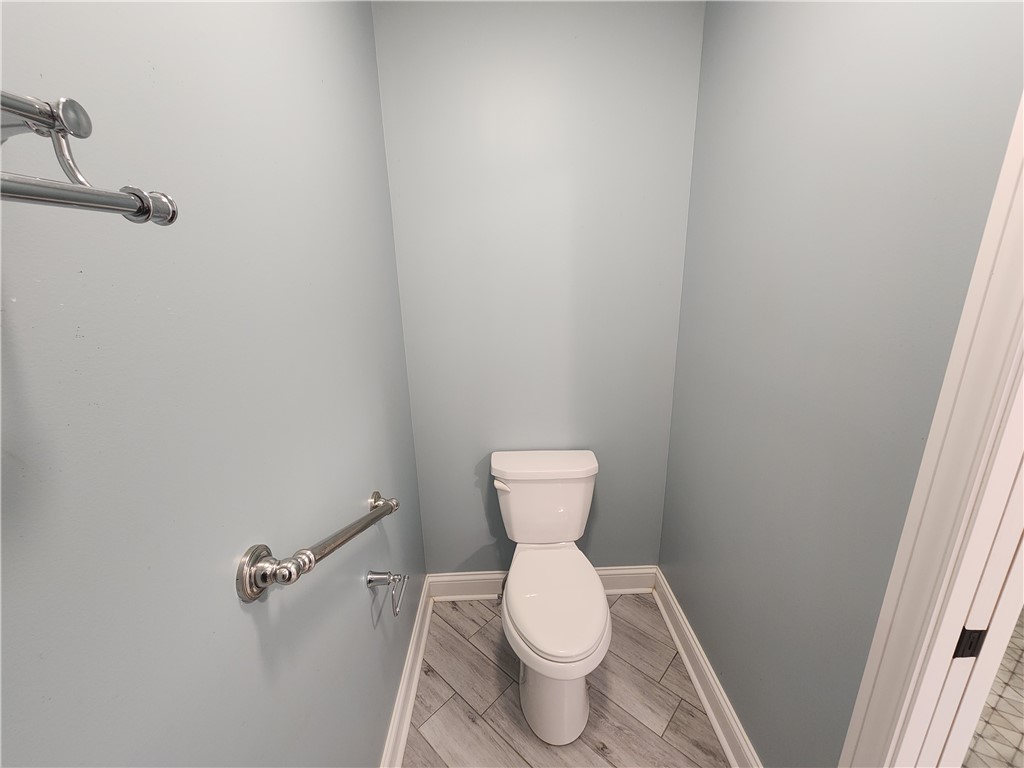 7441 Dodson Road Brookville, OH 45309 - Photo 25 of 50 This compact water closet features clean lines and a durable tile floor.