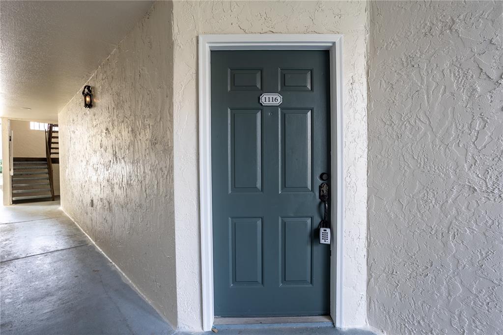 5156 Conroy Road, Unit 16 Orlando, FL 32811 - Photo 2 of 16 view of a bathroom from a hallway