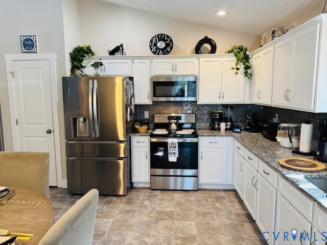 378 Halls Store Road Mineral, VA 23117 - Photo 11 of 35 a kitchen with stainless steel appliances granite countertop a refrigerator a stove top oven a sink and dishwasher