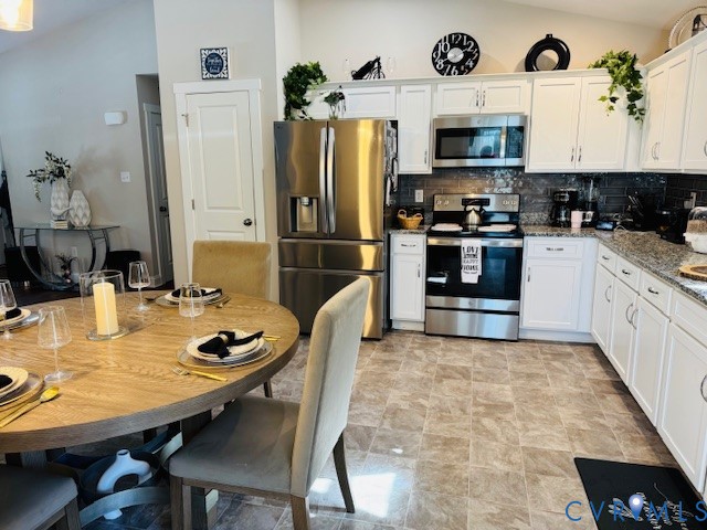 378 Halls Store Road Mineral, VA 23117 - Photo 12 of 35 a kitchen with refrigerator and stove