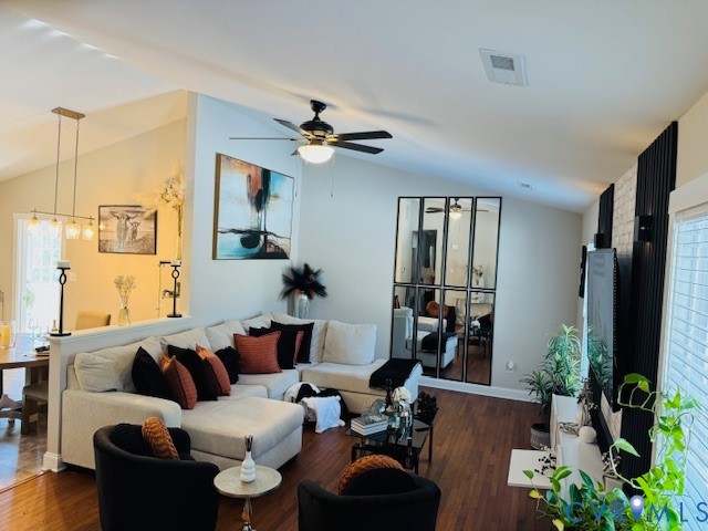 378 Halls Store Road Mineral, VA 23117 - Photo 14 of 35 a living room with furniture a chandelier and a flat screen tv
