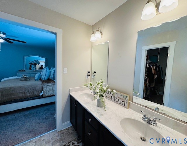 378 Halls Store Road Mineral, VA 23117 - Photo 21 of 35 a en suite bathroom with a double vanity sink and a mirror