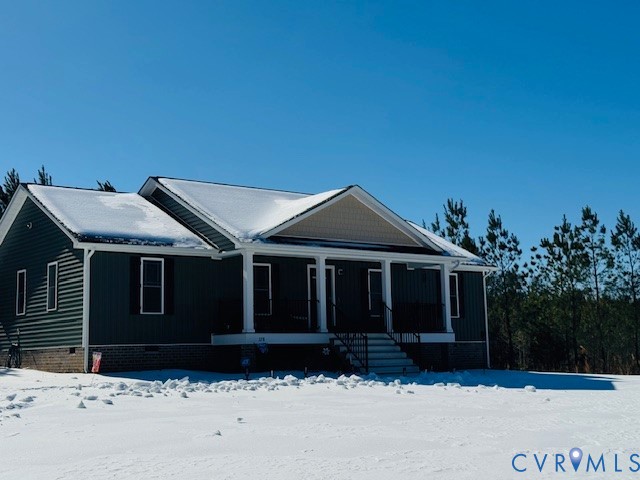 378 Halls Store Road Mineral, VA 23117 - Photo 3 of 35 a front view of a house with a yard