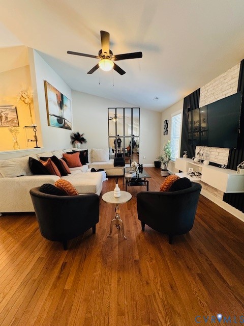 378 Halls Store Road Mineral, VA 23117 - Photo 31 of 35 a living room with couches and a flat screen tv with kitchen view