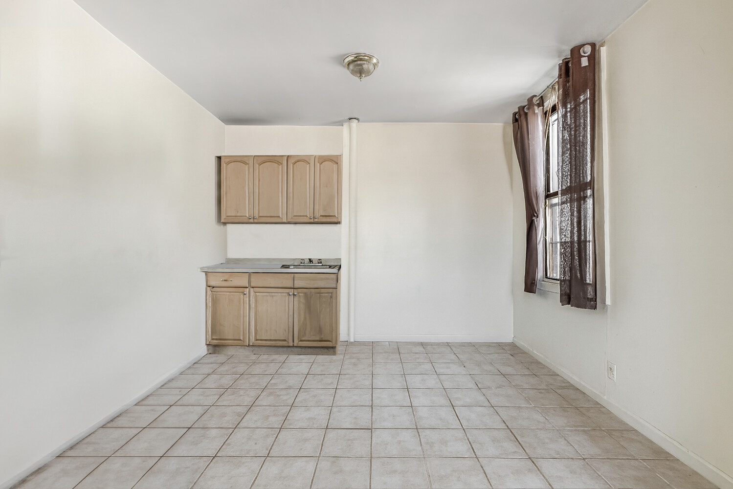 101 Graham Avenue, Unit MULTIFAMIL Brooklyn, NY 11206 - Photo 7 of 9 a view of utility room
