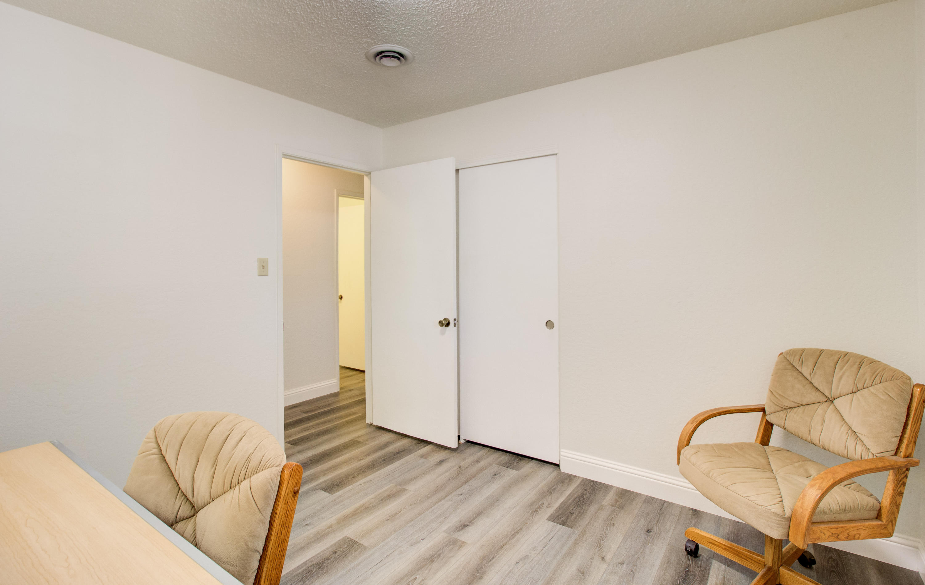 2602 Irwin Road Redding, CA 96002 - Photo 14 of 27 a room with a bed and a chair