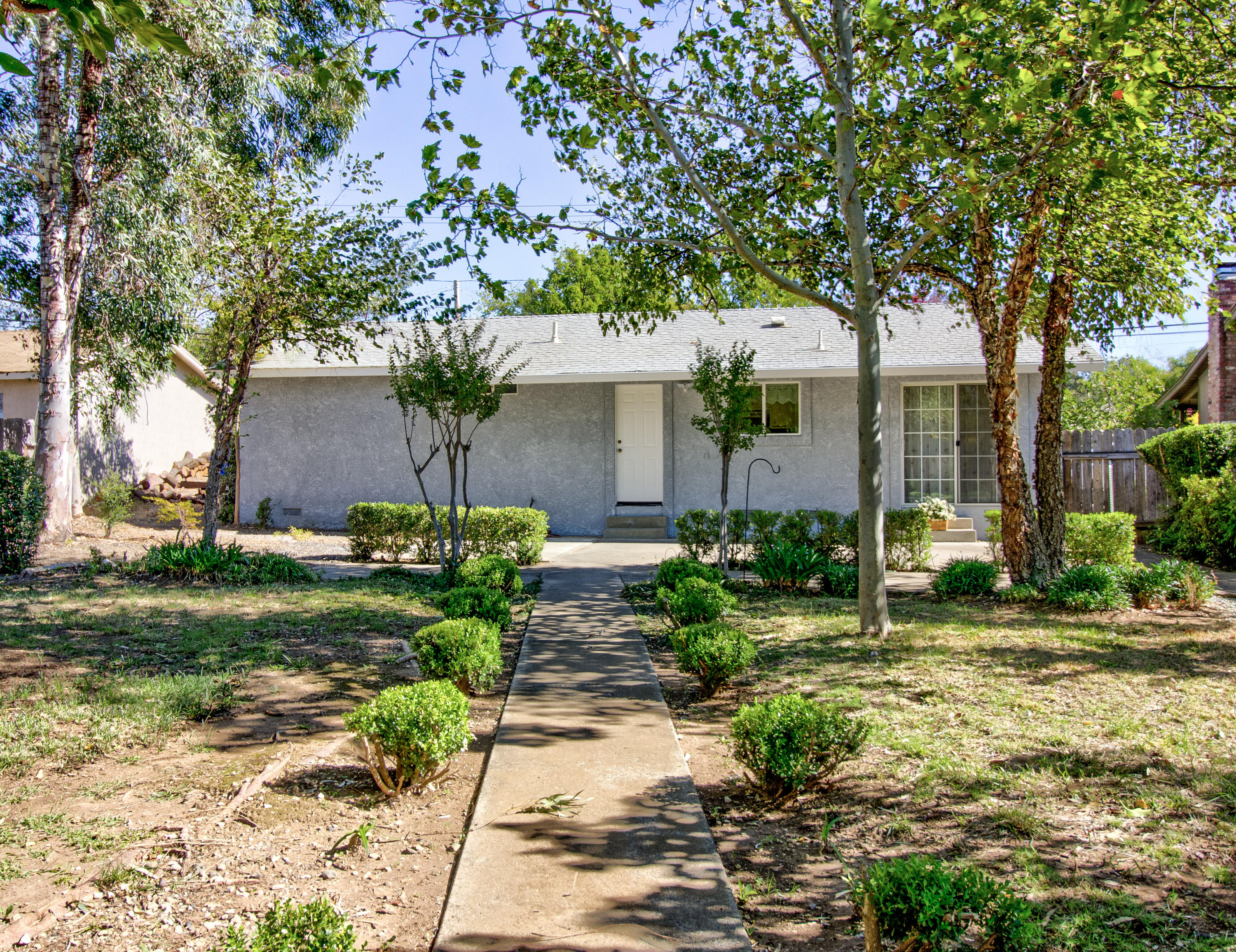 2602 Irwin Road Redding, CA 96002 - Photo 24 of 27 a front view of a house with garden