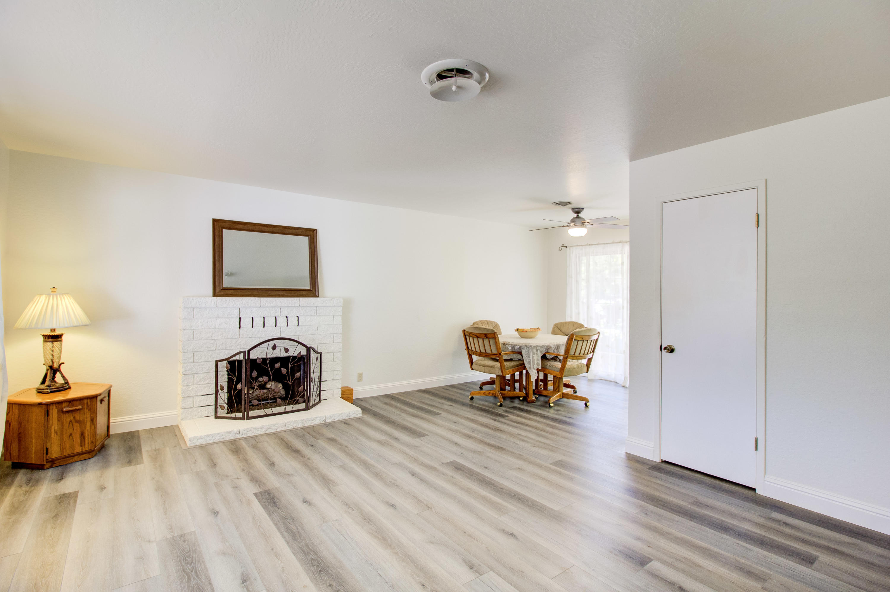 2602 Irwin Road Redding, CA 96002 - Photo 4 of 27 a living room with furniture and a fireplace