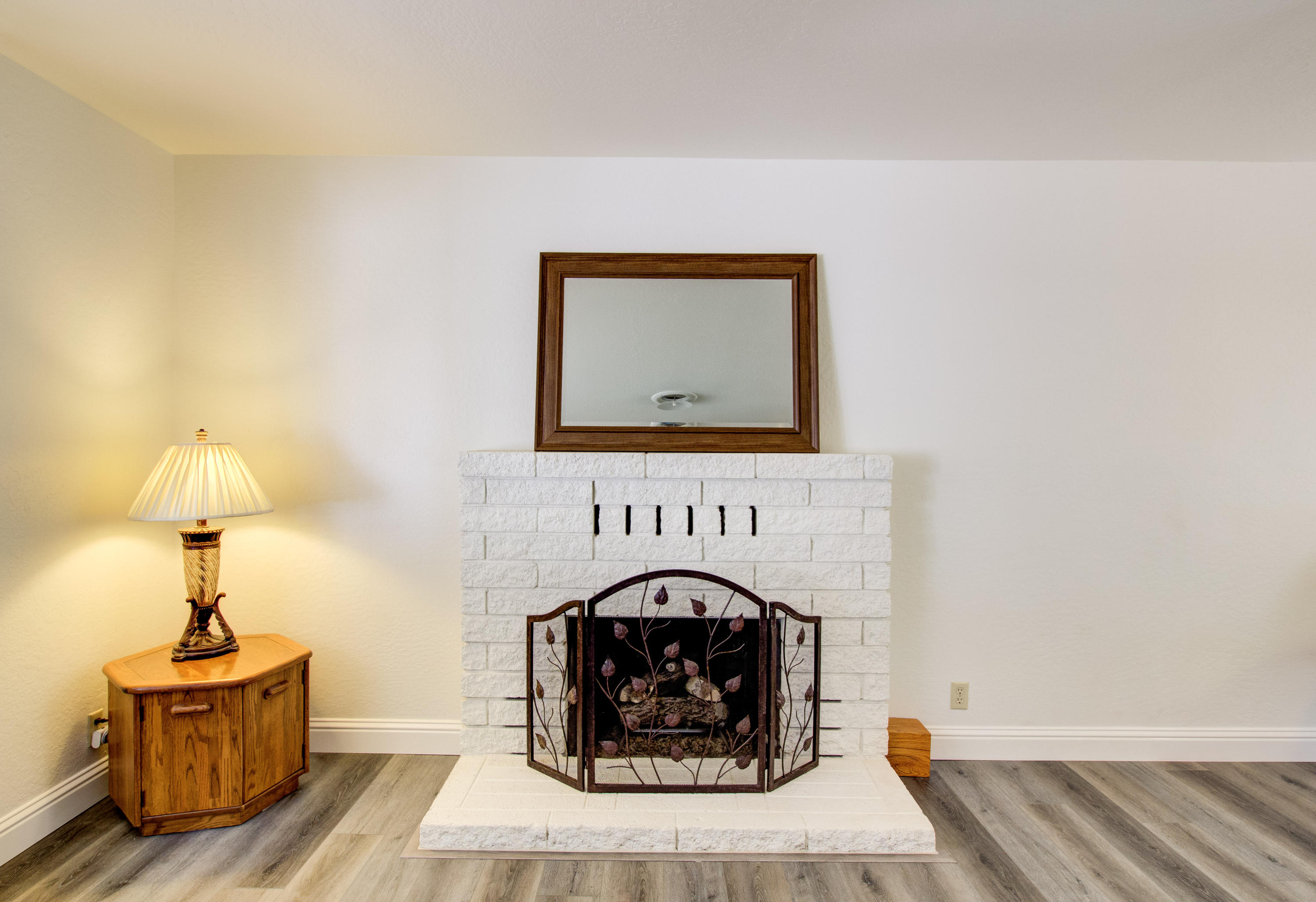 2602 Irwin Road Redding, CA 96002 - Photo 7 of 27 a living room with furniture and a fireplace