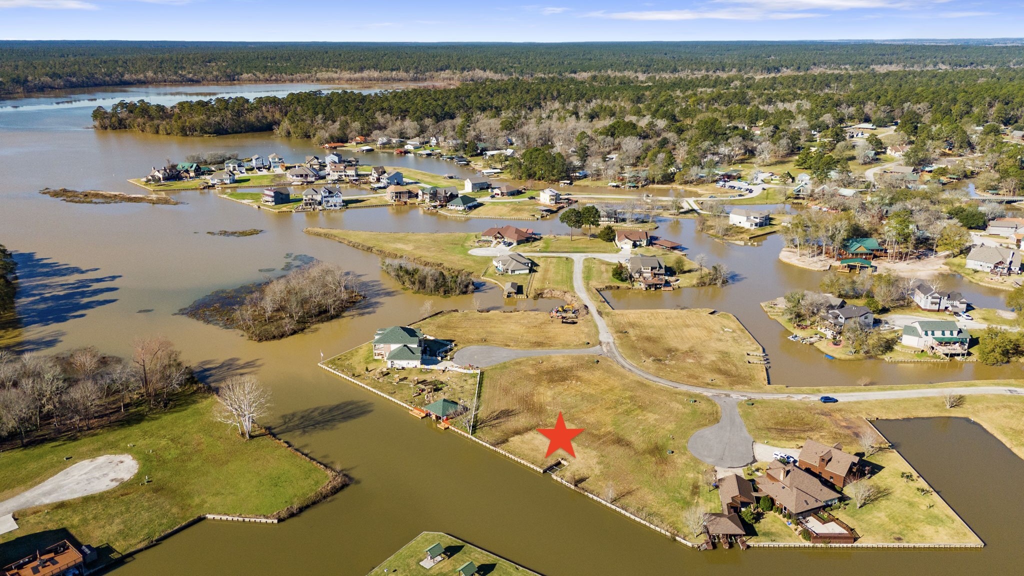 Almost HALF-ACRE WATERFRONT lot on Lake Conroe! Look at the beauty....come get it!