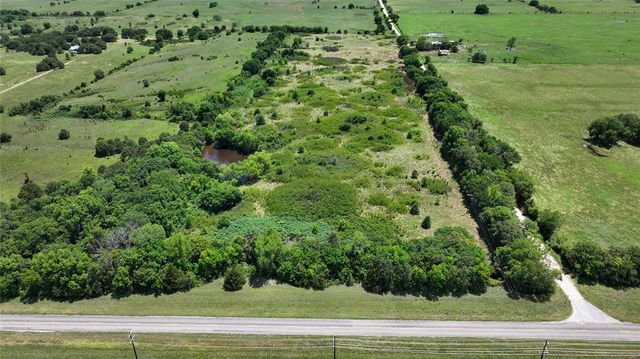 a view of a green yard