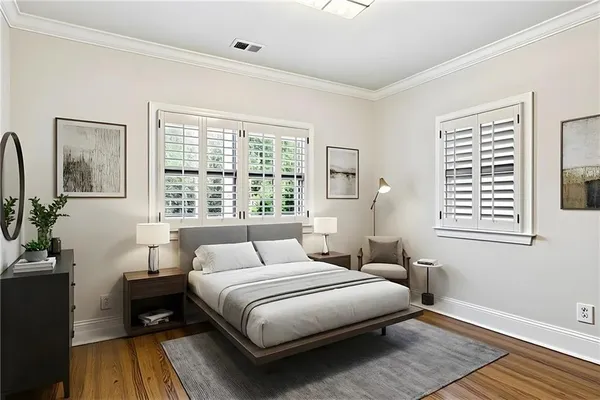 a bath tub sitting in a bathroom next to a window