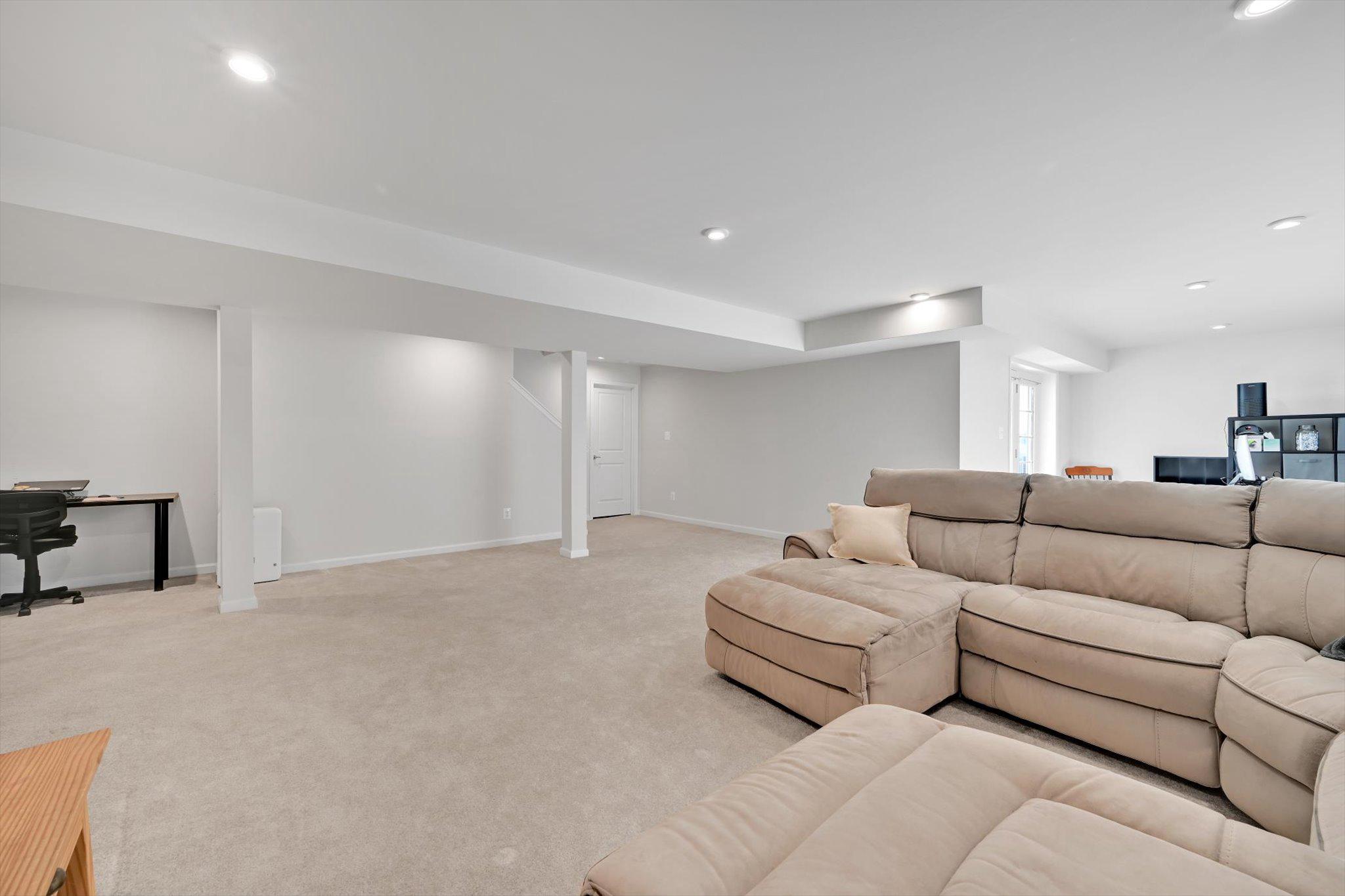 415 Courtland Road Atglen, PA 19310 - Photo 19 of 26 a living room with couches and kitchen view