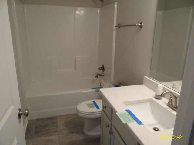 13733 Macon Road Upatoi, GA 31829 - Photo 27 of 27 a white toilet sitting next to a bath tub