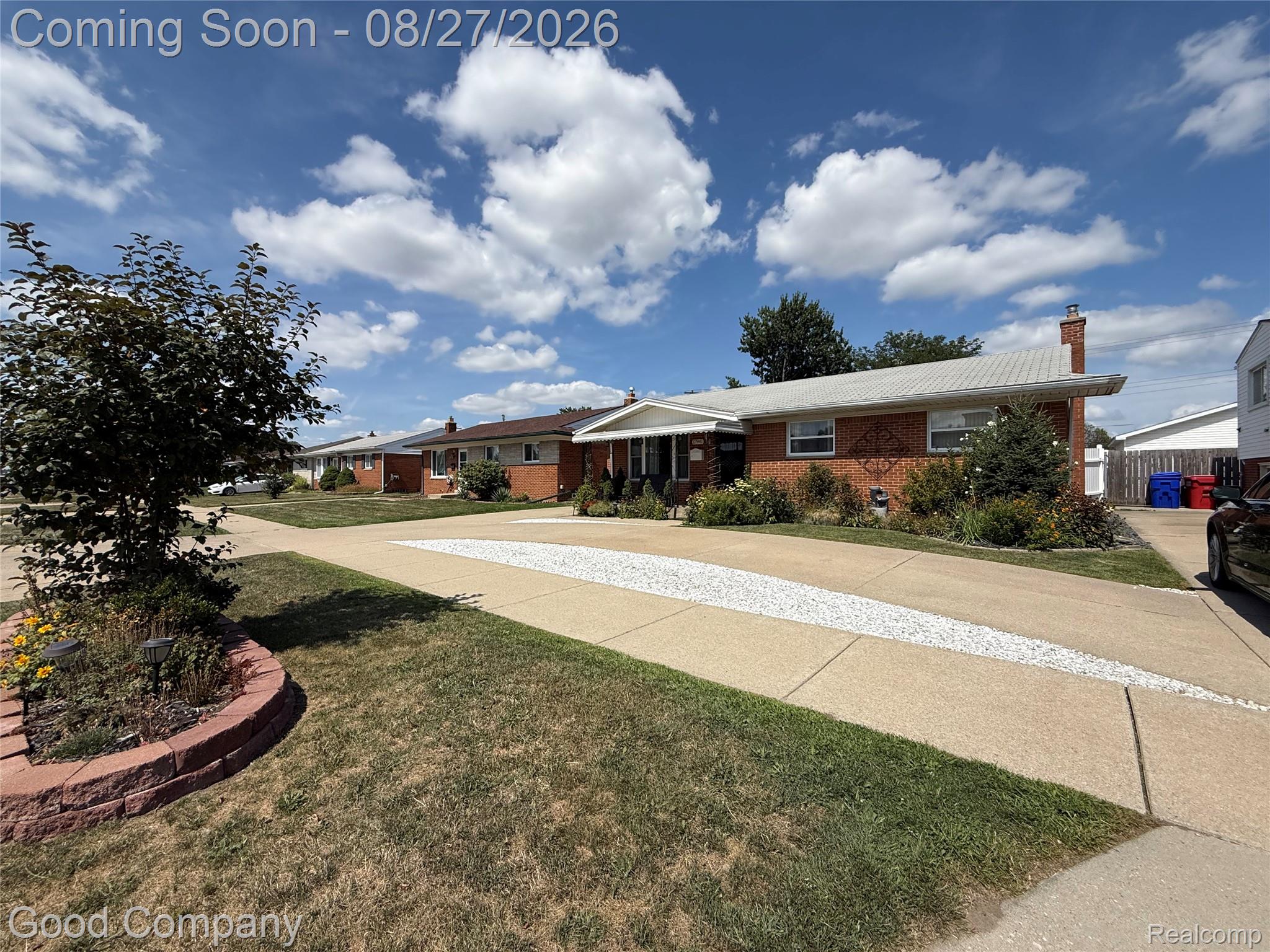 17941 East 13 Mile Road Fraser, MI 48026 - Photo 22 of 32 Brick exterior with a gabled roof and a chimney