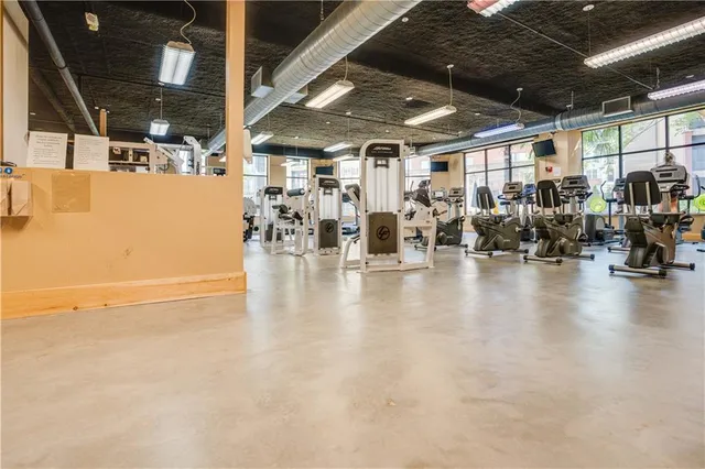 a view of a studio with wooden floor