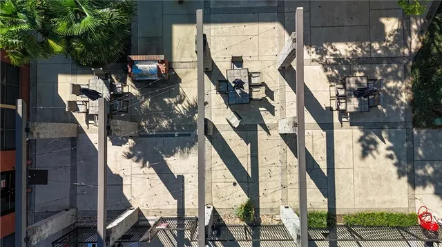 a view of a chairs and table in the patio