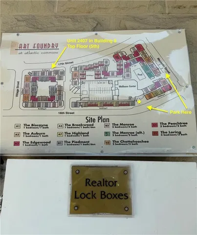 a sign that is sitting on a wall