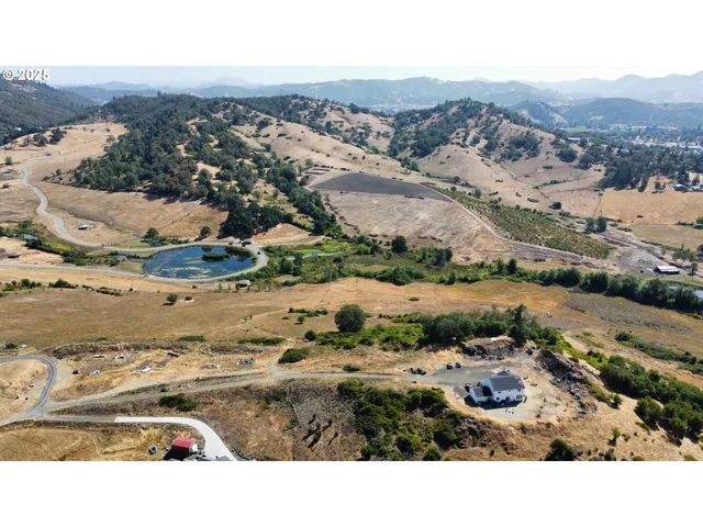 a view of car parked in front of garage