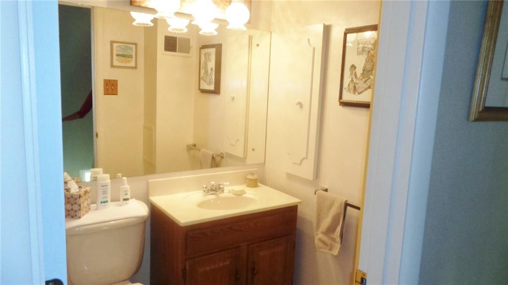 5075 West Harbison Road Pittsburgh, PA 15276 - Photo 17 of 21 MAIN BATH. FRESHLY PAINTED, WITH BATH FITTERS SHOWER/TUB. UPDATED LIGHTING.