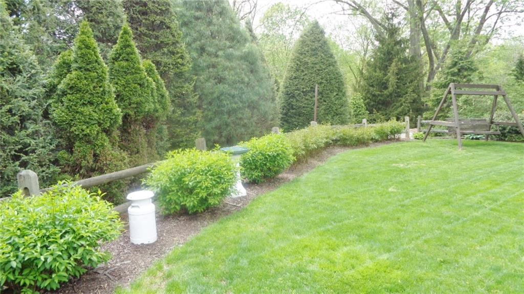 5075 West Harbison Road Pittsburgh, PA 15276 - Photo 21 of 21 PRETTY PERENNIALS SURROUND THE REAR YARD. LOADS OF PRIVACY HERE!
