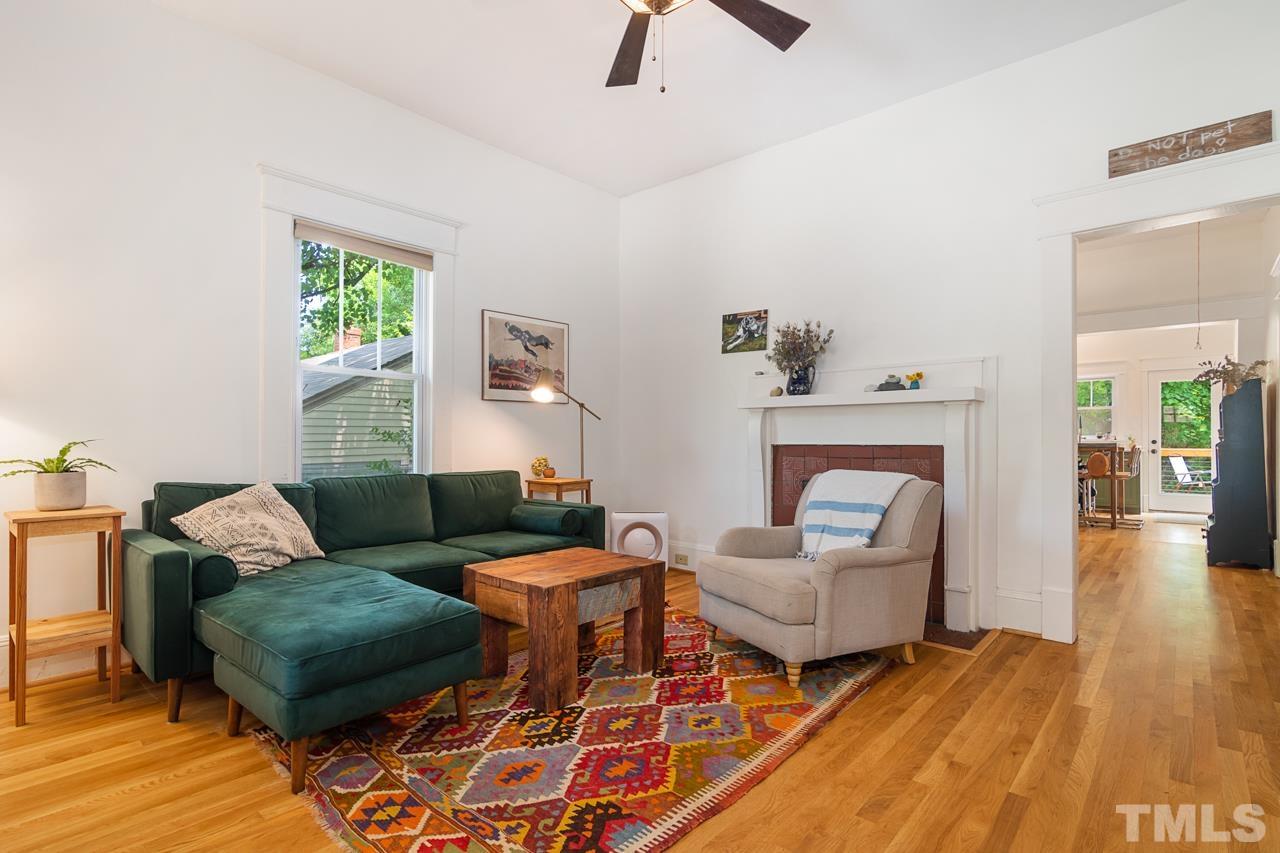 1808 Rosetta Drive Durham, NC 27701 - Photo 12 of 59 a living room with furniture and a wooden floor