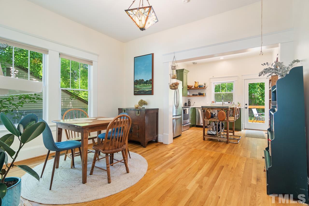 1808 Rosetta Drive Durham, NC 27701 - Photo 19 of 59 a view of a dining room with furniture window and outside view