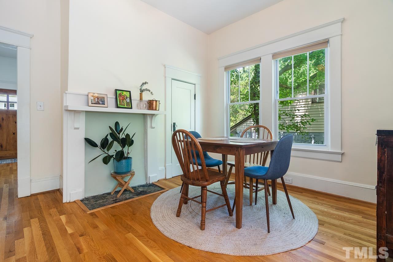 1808 Rosetta Drive Durham, NC 27701 - Photo 22 of 59 a view of a dining room with furniture window and wooden floor