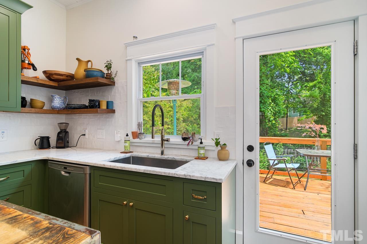1808 Rosetta Drive Durham, NC 27701 - Photo 30 of 59 a kitchen with a sink and a window