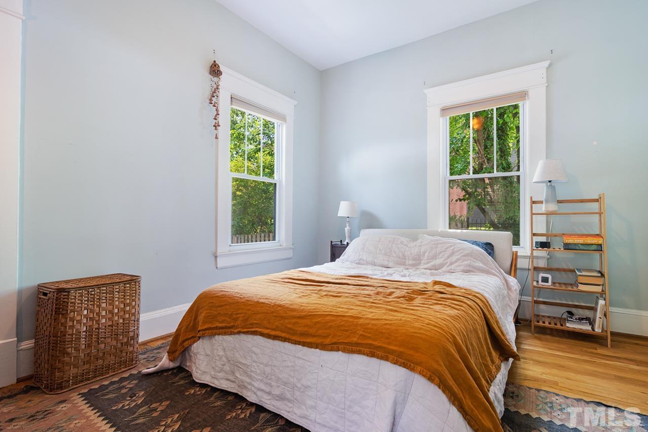 1808 Rosetta Drive Durham, NC 27701 - Photo 36 of 59 a bedroom with a bed and a window