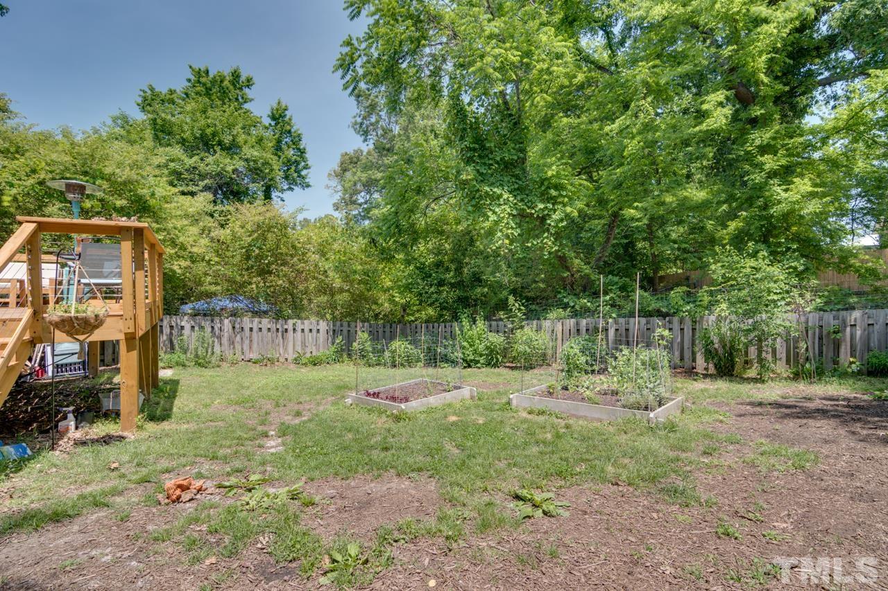 1808 Rosetta Drive Durham, NC 27701 - Photo 47 of 59 a backyard of a house with barbeque oven