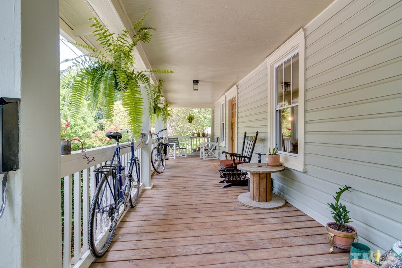 1808 Rosetta Drive Durham, NC 27701 - Photo 6 of 59 a view of a porch with wooden floor
