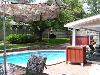 2735 Whitewood Road Bethlehem, PA 18017 - Photo 18 of 20 rear covered patio/pool and spa area