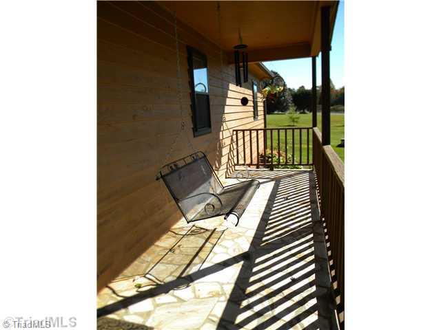 1426 Mitchell Road Pilot Mountain, NC 27041 - Photo 2 of 16 Other. Front Porch to relax and enjoy the day.