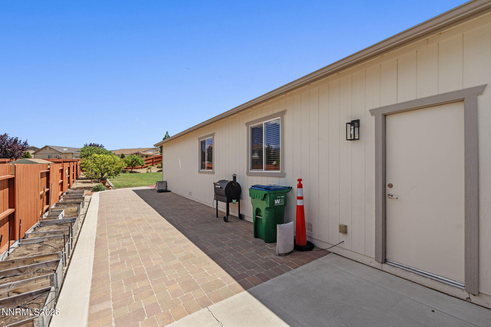 18324 Panda Bear Court Reno, NV 89508 - Photo 24 of 44 a view of house with backyard and sitting area